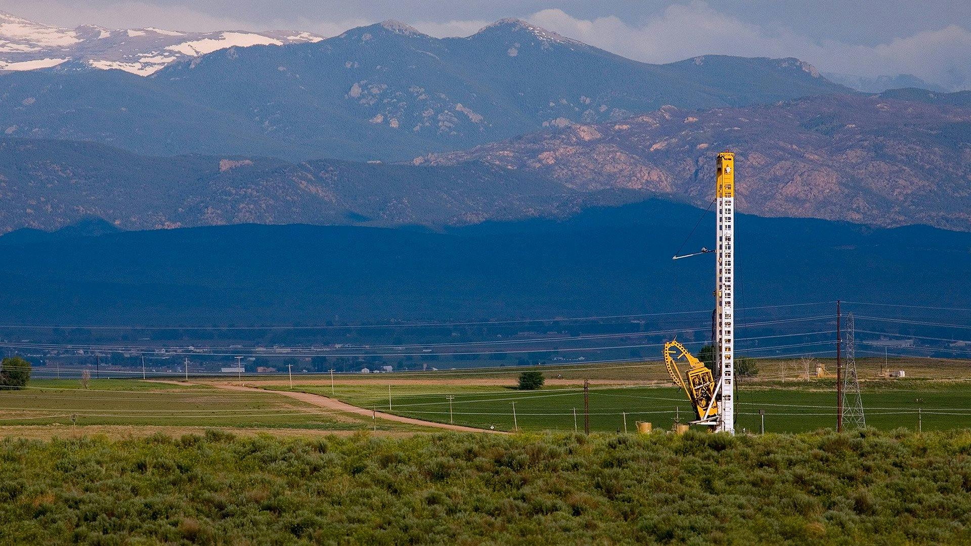Mountains of Colorado with rig in foreground